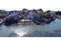 Stunning waterfront property with neighboring homes and docks at 268 Little Oak Island Dr, Folly Beach, SC 29439