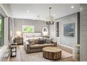 Spacious bedroom with a comfy seating area and ensuite bathroom at 3115 Ion Ave # C, Sullivans Island, SC 29482