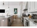 Modern kitchen featuring granite counters and stainless steel appliances at 3115 Ion Ave # B, Sullivans Island, SC 29482