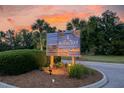 Bohiket Marina & Market sign at entrance with amenities listed at 1880 Andell Bluff Blvd # D-16, Seabrook Island, SC 29455