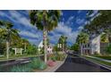 Street view of charming homes with lush landscaping and palm trees at 516 Hayes Park Blvd # 1, Johns Island, SC 29455