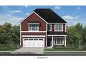 Two-story red home with white garage door and landscaping at 221 Old Grove Ave, Moncks Corner, SC 29461
