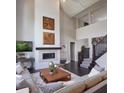 Spacious living room with a two-story high ceiling, fireplace, and hardwood floors at 639 Faulkner Dr, Mount Pleasant, SC 29466