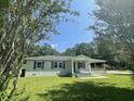 Newly renovated house with a spacious front yard at 902 Poplar St, Walterboro, SC 29488
