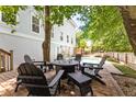 Backyard patio with fire pit and seating area at 7 33Rd Ave, Isle of Palms, SC 29451