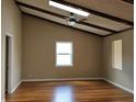 Bright bedroom with hardwood floors, vaulted ceilings, and skylights at 757 Backfield Rd, Walterboro, SC 29488