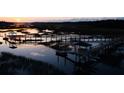 Sunset view of community boardwalk and dock access on calm water at 3834 Delinger Dr, Mount Pleasant, SC 29466