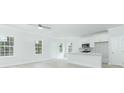 Modern kitchen with white cabinets, island, and stainless steel appliances at 105 Equestrian Ct, Summerville, SC 29486