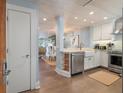 Modern kitchen with stainless steel appliances and white cabinets at 4426 Sea Forest Dr, Kiawah Island, SC 29455