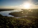 Aerial view of the Wando River at sunrise, showcasing waterfront property at 3850 Delinger Dr, Mount Pleasant, SC 29466