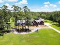Spacious home on a large lot with a circular driveway at 1426 Sc-45, McClellanville, SC 29458