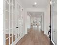 Bright entryway with hardwood floors and French doors at 1714 Cultivation Ln # 537, Mount Pleasant, SC 29466