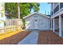 Charming cottage with a private backyard and walkway at 118 E Ashley And 110 E Cooper Ave Ave, Folly Beach, SC 29439