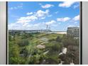 Stunning bridge and marsh view from a window; perfect for relaxing at 252 Cooper River Dr, Mount Pleasant, SC 29464