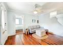 Living area with hardwood floors and view into bedroom at 8 Sires St # A&B, Charleston, SC 29403