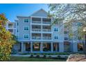 Multi-story building with parking underneath at 1984 Folly Rd # B304, Charleston, SC 29412