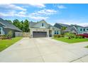 Two-car garage craftsman style home on a quiet street at 426 Omaha Dr, Moncks Corner, SC 29461