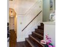 Elegant entryway with dark hardwood floors and staircase at 1720 Live Oak Park, Seabrook Island, SC 29455