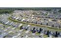 Aerial view of a large community with many new homes at 253 River Martin Ct, Summerville, SC 29483