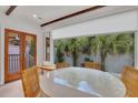 Dining area with round table and chairs, overlooking a patio at 40 Morris St, Charleston, SC 29403