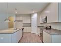 Modern kitchen with granite countertops and stainless steel appliances at 537 Rendezvous Way, Huger, SC 29450
