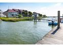 Tranquil waterfront view with boat slips and calm water at 2 Mcdonough Rd # F-2, Folly Beach, SC 29439