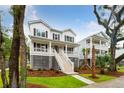 Stunning two-story home with a welcoming front porch at 1659 Cultivation Ln # 454, Mount Pleasant, SC 29466