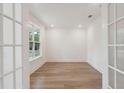 Bright office with hardwood floors, large window, and French doors at 1653 Siloh Dr # 490, Mount Pleasant, SC 29466
