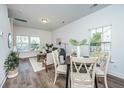 Bright dining area with table and chairs, adjacent to living room at 404 Gravy Train St, Charleston, SC 29414