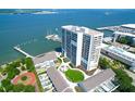 Aerial view showing a high-rise building near a marina and waterfront at 330 Concord St # 5 A, Charleston, SC 29401