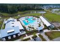 Aerial view of resort-style pool with expansive sundeck and clubhouse at 452 Ripple Park Dr, Summerville, SC 29486
