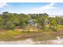 Secluded home on a tree-lined island, steps away from the beach at 3064 Marshgate Dr, Seabrook Island, SC 29455