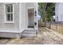Front entrance with steps leading up to a small covered porch at 291 Coming St, Charleston, SC 29403