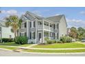 Two-story home with gray siding and black shutters at 1112 Dawn View Ter, Mount Pleasant, SC 29464