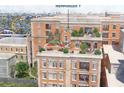 Shared rooftop terrace with lounge seating and city views at 609 King St # 615, Charleston, SC 29403