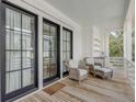 Relaxing porch with wicker chairs and access to the interior at 3025 Southerly Way, Johns Island, SC 29455