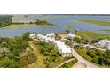 Aerial view of houses near the water at 3025 Southerly Way, Johns Island, SC 29455