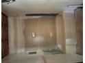 Bathroom gutted for renovation, showing subfloor and plumbing at 306 Ackerman St, Walterboro, SC 29488
