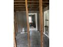 Room under renovation, showing exposed walls and flooring at 306 Ackerman St, Walterboro, SC 29488