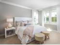 Spacious bedroom with large windows and cozy bedding at 1089 Keeper Ln, Summerville, SC 29485