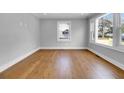 Spacious living room with hardwood floors and lots of natural light at 4961 Baylor Ave, North Charleston, SC 29405