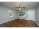 Bright living room featuring hardwood floors and neutral-colored walls at 4418 Cindy Ln, North Charleston, SC 29418
