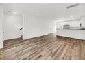 Spacious living area with hardwood floors and kitchen at 2312 Meridian Rd, North Charleston, SC 29405