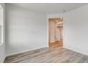 Spare bedroom with hardwood floors and view of the staircase at 293 Shadybrook Dr, Summerville, SC 29486