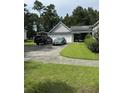 Two-car garage with additional covered parking at 86 Watershed Ct, Walterboro, SC 29488