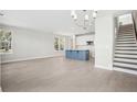 Spacious living room with hardwood floors and open concept design at 410 Queenview Ln, Charleston, SC 29414