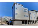 Modern three-story home with gray siding at 315 Ashley Ave # C, Charleston, SC 29403