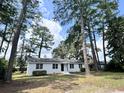 Charming white brick ranch home surrounded by trees at 201 Josie Dr, Walterboro, SC 29488