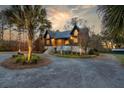 A captivating home with a long driveway and lush landscaping at 2773 Mt Carmel Rd, Walterboro, SC 29488