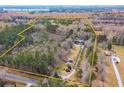 Aerial view of a house on a large lot surrounded by trees at 2773 Mt Carmel Rd, Walterboro, SC 29488